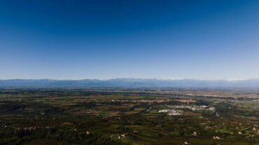 countryside with mountain range