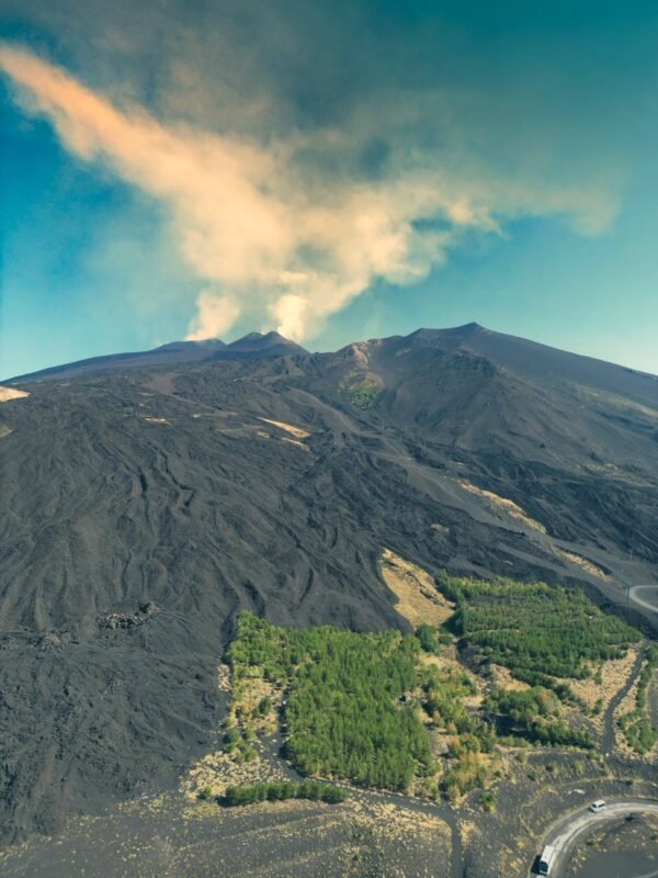 aerial view of mount etna with lava fields