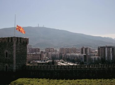 panoramic view of skopje with macedonian flag