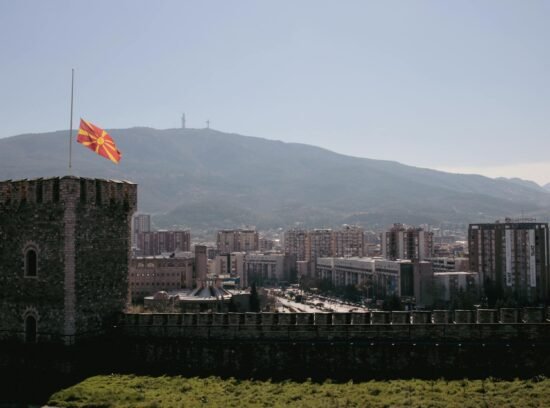 panoramic view of skopje with macedonian flag