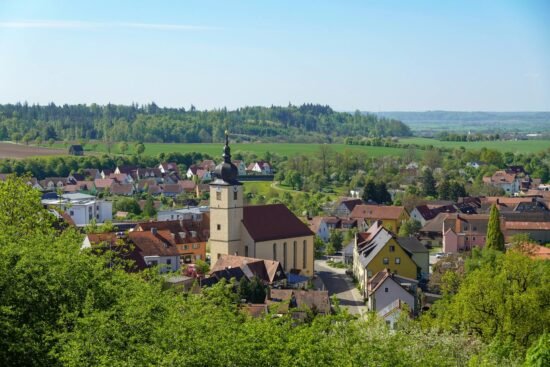 scenic view of quaint village with church